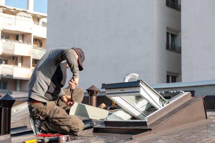 worker fixing fibreglass